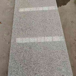 日照芝麻白光面毛板